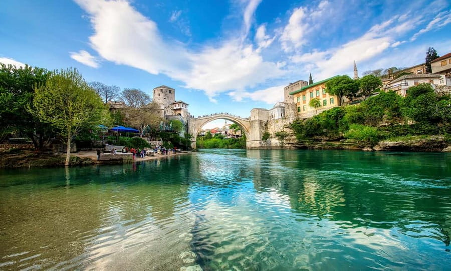 Dubrovnik: Mostar & Kravica Waterfalls Day Trip - Pickup from Dubrovnik and the road into Bosnia