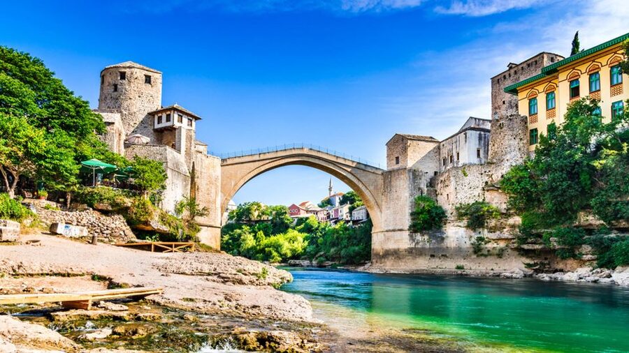 From Split and Trogir: Mostar Tour with Kravica Waterfalls - Three hours in Mostar: guided sights, food, and free wandering