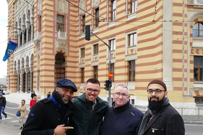 PROFESSIONAL SARAJEVO WALKING TOUR - With guide who guided STING! - City Hall, Inat Kuca, and the view toward the fortresses