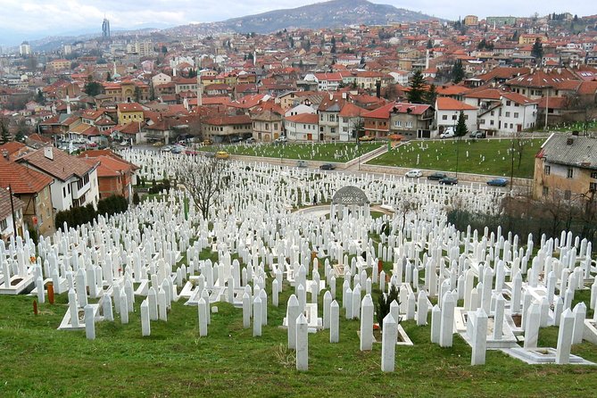Times of Misfortune - Life Under Siege and the Tunnel of Hope - Sarajevo landmarks viewed from the vehicle